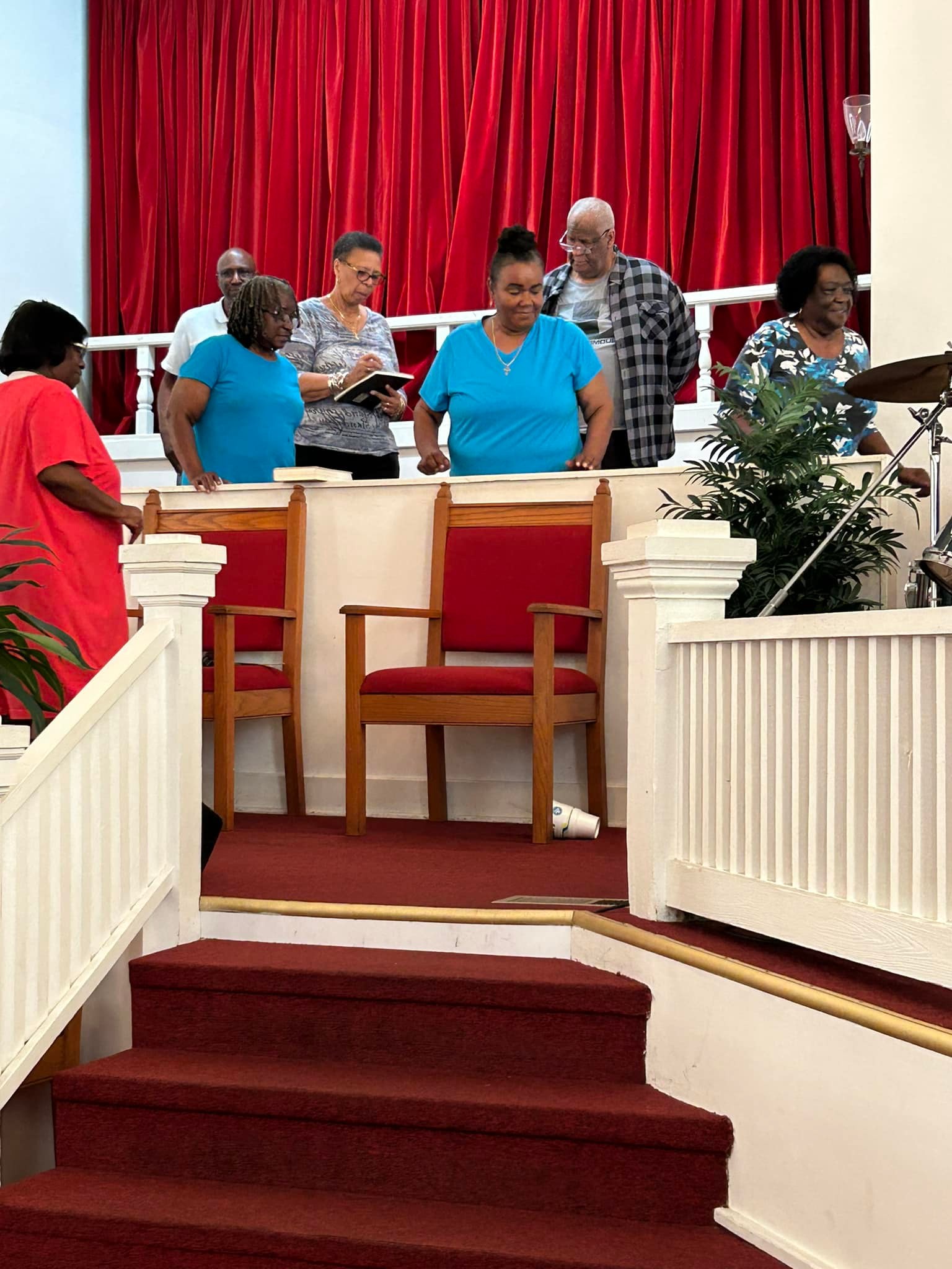 FABC choir and musicians preparing in the sanctuary