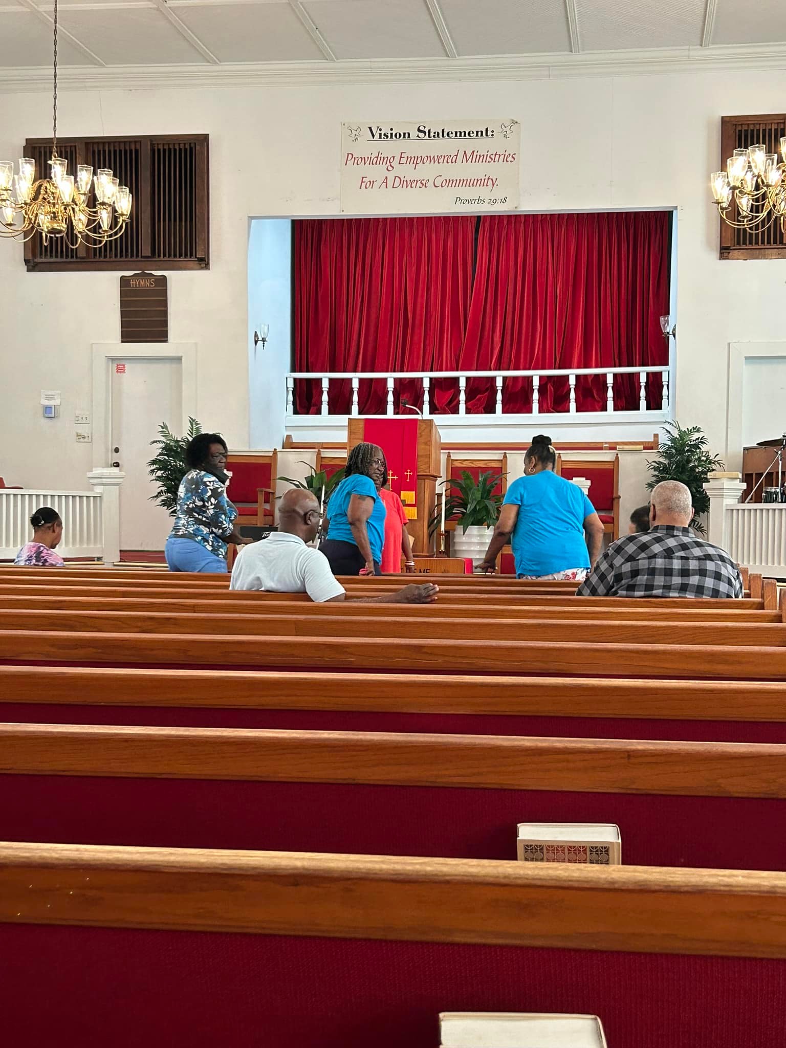 FABC members gathered in the sanctuary during rehearsal